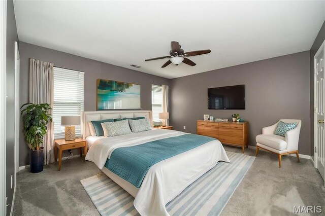 5541 Wavecrest Cir, Saint Charles, MO 63304 - carpeted bedroom featuring baseboards and ceiling fan