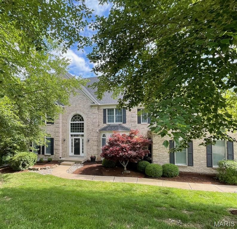 1655 Wildhorse Parkway Dr, Wildwood, MO 63005 - view of front facade featuring a front lawn and brick siding