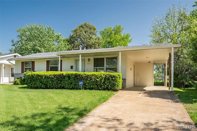 525 Angelus Dr, Florissant, MO 63031 - view of front of property with a front yard, a carport, and concrete driveway