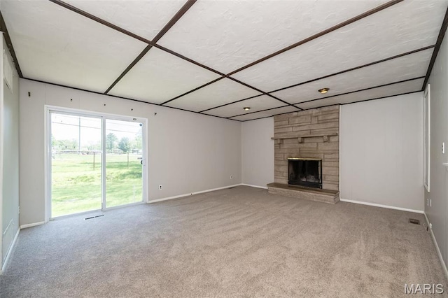 525 Angelus Dr, Florissant, MO 63031 - unfurnished living room with carpet, baseboards, and a fireplace