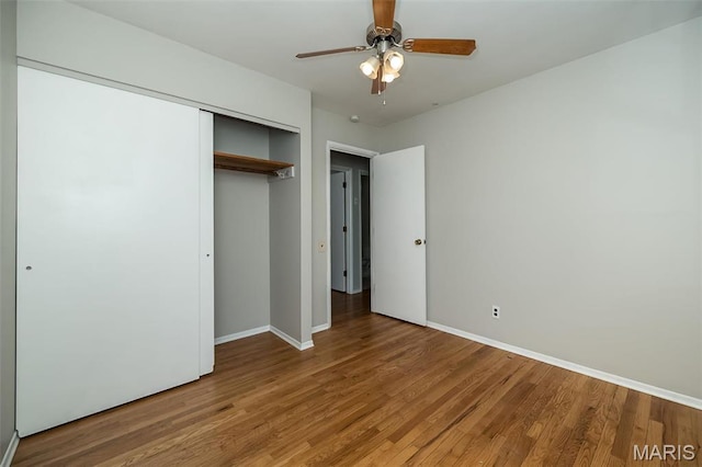 525 Angelus Dr, Florissant, MO 63031 - unfurnished bedroom featuring light wood finished floors, baseboards, and a closet