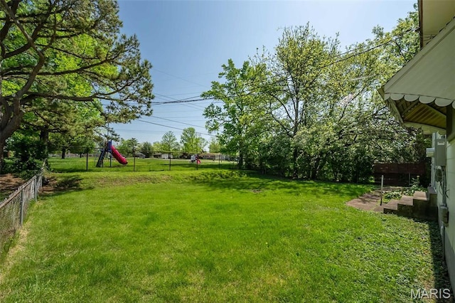 525 Angelus Dr, Florissant, MO 63031 - view of yard featuring a playground