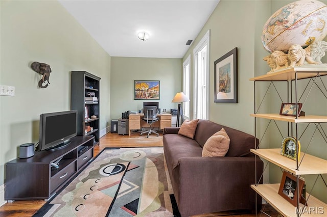 2612 S Compton Ave, Saint Louis, MO 63118 - living room featuring an office area and wood finished floors