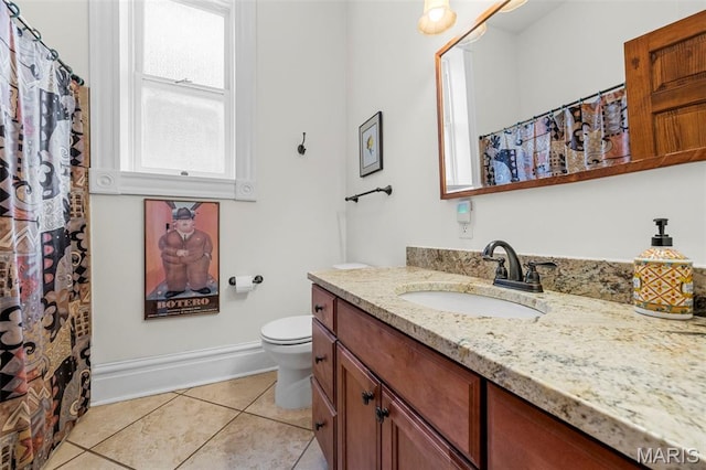 2612 S Compton Ave, Saint Louis, MO 63118 - full bath featuring vanity, tile patterned floors, and a shower with shower curtain
