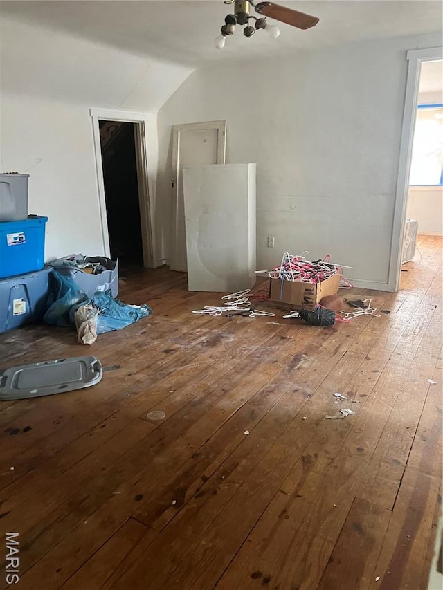 10058 Bon Oak Dr, Saint Louis, MO 63136 - additional living space featuring hardwood / wood-style floors, vaulted ceiling, and a ceiling fan
