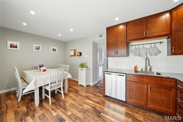 10566 Carroll Wood Way, Saint Louis, MO 63128 - kitchen featuring dishwasher, a sink, recessed lighting, wood finished floors, and tasteful backsplash