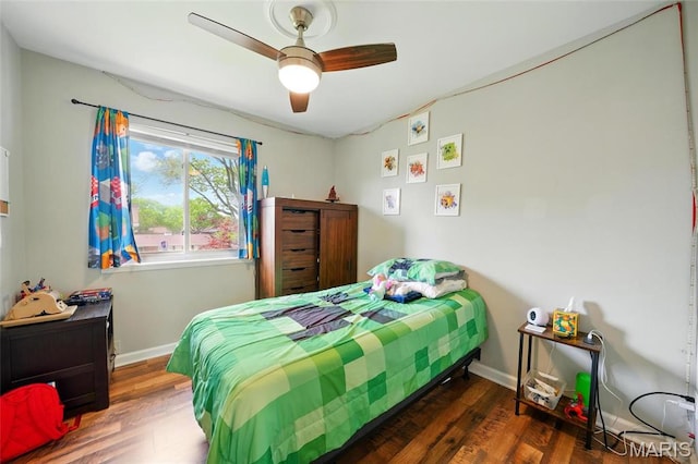10566 Carroll Wood Way, Saint Louis, MO 63128 - bedroom featuring wood finished floors, baseboards, and ceiling fan