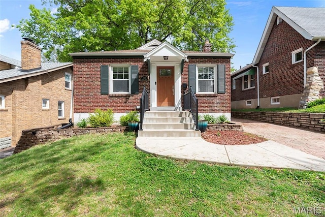 7337 Bruno Ave, Richmond Heights, MO 63117 - bungalow with a chimney, brick siding, a front yard, and entry steps