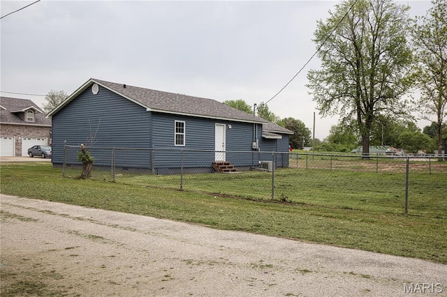 view of home's exterior with roof with shingles