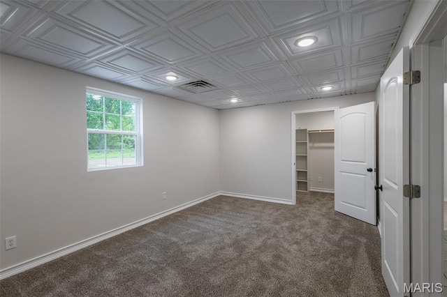 1042 Ash St, Poplar Bluff, MO 63901 - unfurnished room with carpet flooring, baseboards, recessed lighting, and an ornate ceiling