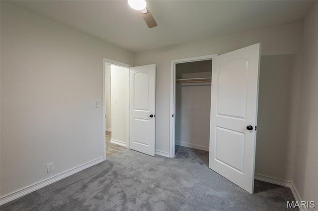 1042 Ash St, Poplar Bluff, MO 63901 - unfurnished bedroom with carpet floors, baseboards, a closet, and a ceiling fan