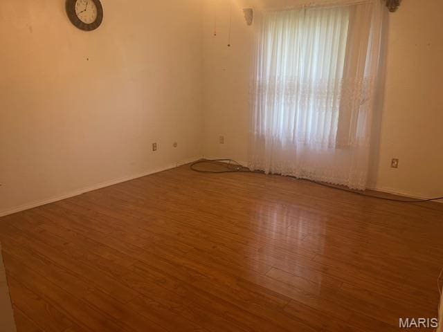 3106 Mimosa St, Cape Girardeau, MO 63701 - empty room featuring wood finished floors