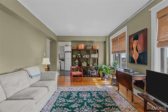 4501 Maryland Ave Unit 603, Saint Louis, MO 63108 - living area featuring wood finished floors, crown molding, and a desk