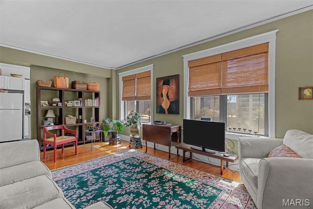 4501 Maryland Ave Unit 603, Saint Louis, MO 63108 - living area featuring wood finished floors and crown molding