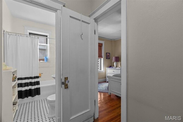 4501 Maryland Ave Unit 603, Saint Louis, MO 63108 - full bathroom with toilet and shower / bathtub combination with curtain