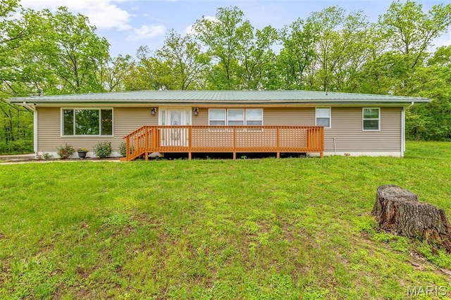 5259 US Highway 61, Bloomsdale, MO 63627 - rear view of property featuring a deck, a lawn, and metal roof