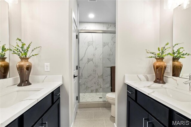 2734 S 59th St, Saint Louis, MO 63139 - full bathroom featuring a marble finish shower, two vanities, tile patterned flooring, and recessed lighting