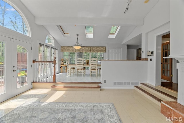 19 Sackston Woods Ln, Saint Louis, MO 63141 - unfurnished sunroom with french doors, a skylight, and track lighting