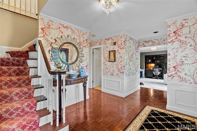 19 Sackston Woods Ln, Saint Louis, MO 63141 - foyer entrance with crown molding, stairs, a wainscoted wall, and wallpapered walls