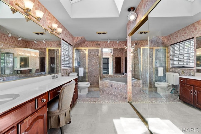19 Sackston Woods Ln, Saint Louis, MO 63141 - bathroom featuring healthy amount of natural light, toilet, double vanity, a garden tub, and tile walls