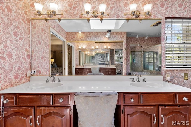19 Sackston Woods Ln, Saint Louis, MO 63141 - bathroom with wallpapered walls, a shower stall, and vanity