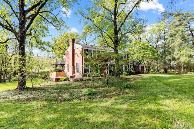 19 Sackston Woods Ln, Saint Louis, MO 63141 - view of grassy yard featuring a deck