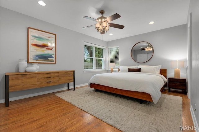 1345 Cheshire Ln, Webster Groves, MO 63119 - bedroom featuring wood finished floors, recessed lighting, baseboards, and a ceiling fan