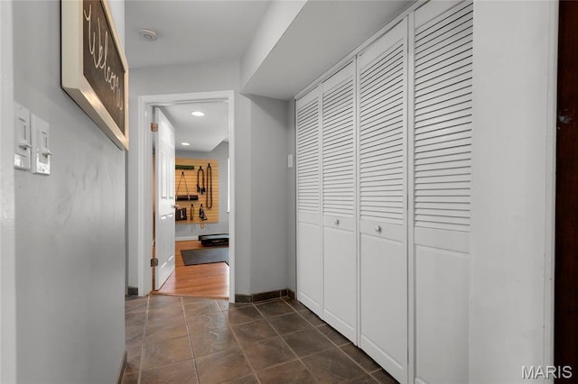 1345 Cheshire Ln, Webster Groves, MO 63119 - hallway featuring recessed lighting, baseboards, and dark tile patterned flooring