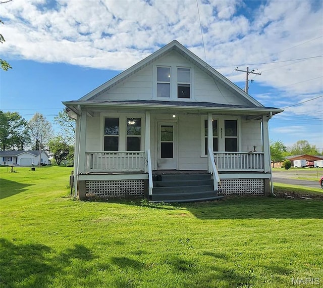 2311 State St, Chester, IL 62233 - bungalow-style home with covered porch and a front yard