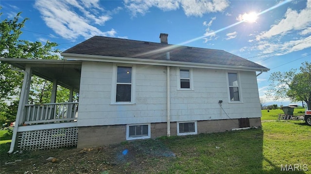 2311 State St, Chester, IL 62233 - rear view of property featuring a lawn, a chimney, and roof with shingles