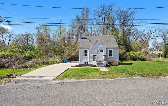 315 Meister St, Collinsville, IL 62234 - bungalow-style home featuring a front yard, a chimney, and driveway