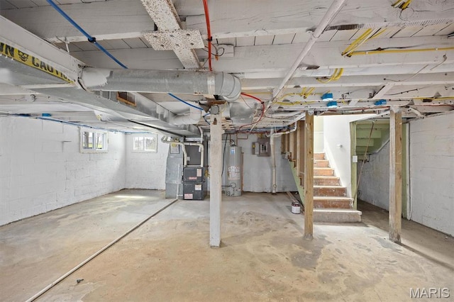 315 Meister St, Collinsville, IL 62234 - basement featuring water heater, heating unit, and stairway
