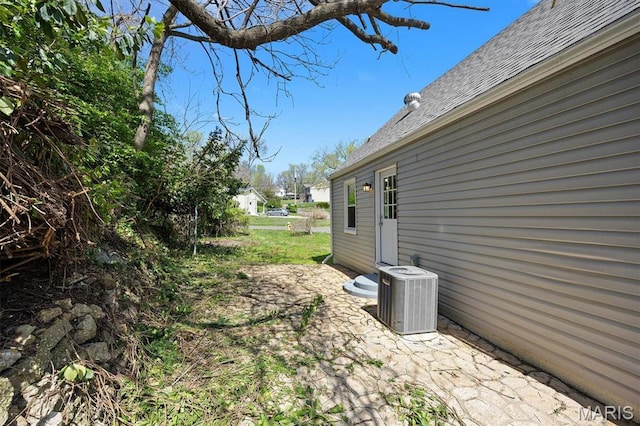 315 Meister St, Collinsville, IL 62234 - view of yard featuring central AC unit and a patio area