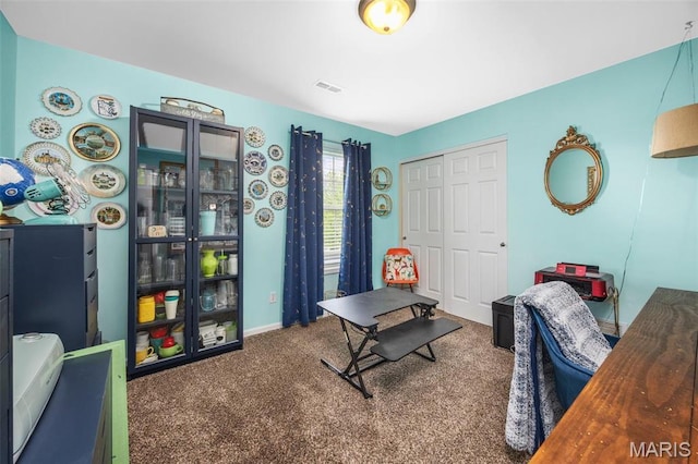 office with carpet flooring and baseboards