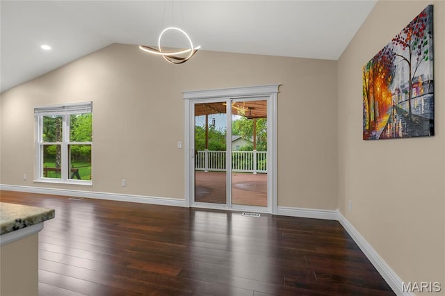 2022 Tramore Ct, Chesterfield, MO 63017 - unfurnished dining area with vaulted ceiling, hardwood / wood-style floors, baseboards, a chandelier, and recessed lighting