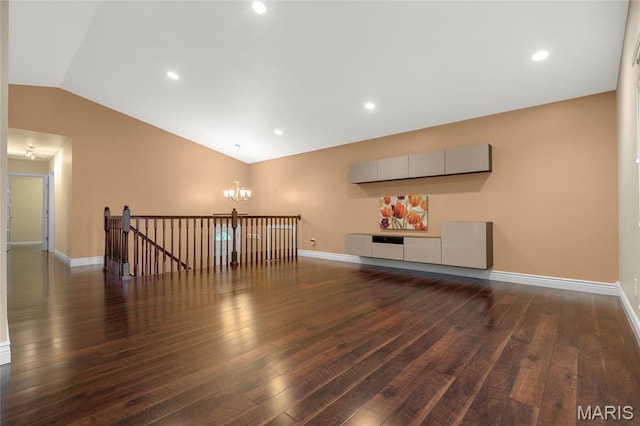 2022 Tramore Ct, Chesterfield, MO 63017 - unfurnished room with lofted ceiling, dark wood finished floors, a chandelier, baseboards, and recessed lighting