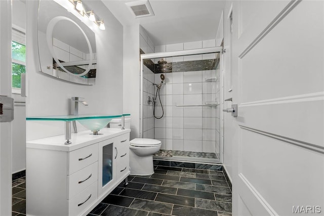 2022 Tramore Ct, Chesterfield, MO 63017 - full bathroom featuring toilet, vanity, and a stall shower