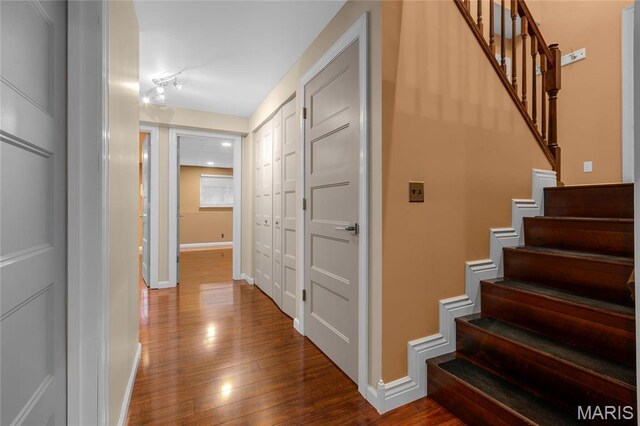 2022 Tramore Ct, Chesterfield, MO 63017 - stairs featuring hardwood / wood-style floors and baseboards