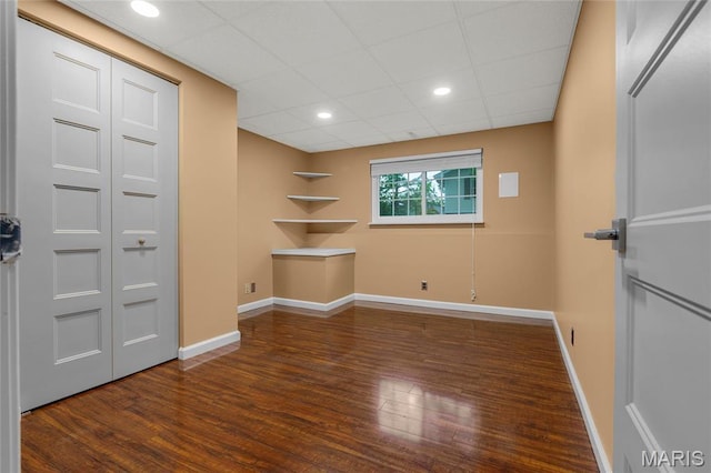 2022 Tramore Ct, Chesterfield, MO 63017 - unfurnished room with wood finished floors, a drop ceiling, baseboards, and recessed lighting
