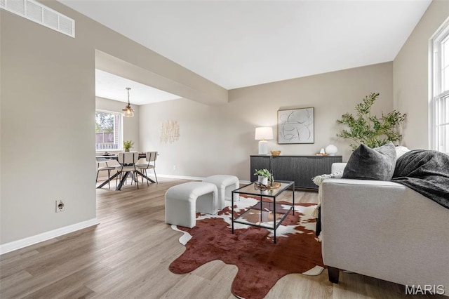 948 Barbara Ann Ln, Ellisville, MO 63021 - living area featuring wood finished floors and baseboards