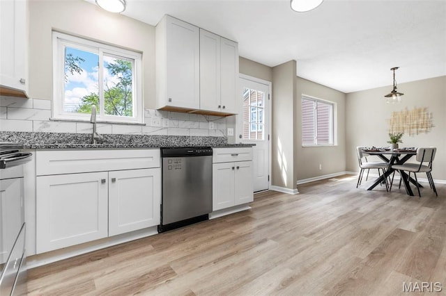 948 Barbara Ann Ln, Ellisville, MO 63021 - kitchen featuring dishwasher, light wood-style flooring, backsplash, and white cabinets