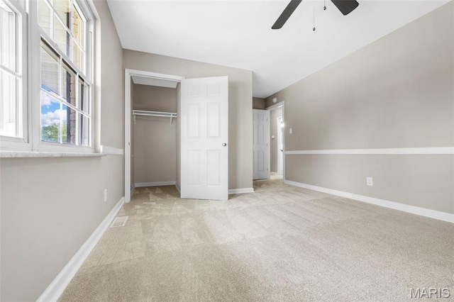 948 Barbara Ann Ln, Ellisville, MO 63021 - unfurnished bedroom featuring carpet, multiple windows, a closet, and ceiling fan