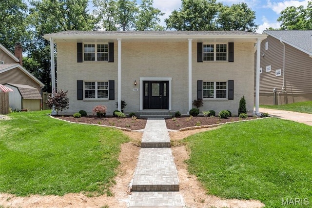 948 Barbara Ann Ln, Ellisville, MO 63021 - greek revival inspired property featuring brick siding
