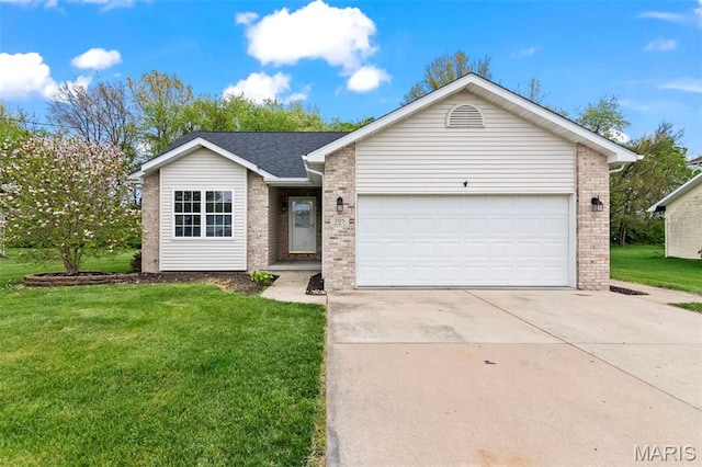 705 Fulton St, Gillespie, IL 62033 - ranch-style home featuring brick siding, a front yard, driveway, and a garage