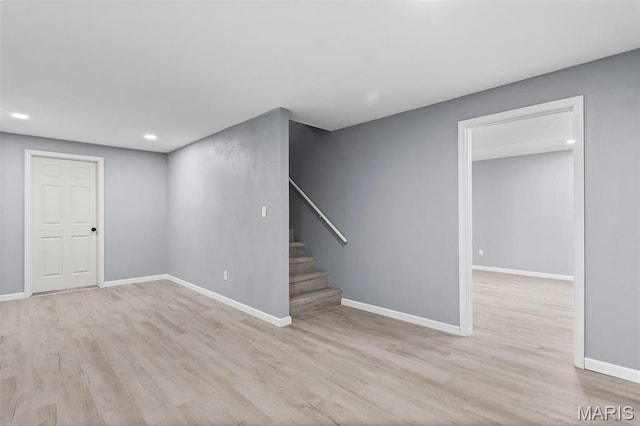 705 Fulton St, Gillespie, IL 62033 - below grade area with wood finished floors, recessed lighting, baseboards, and stairs