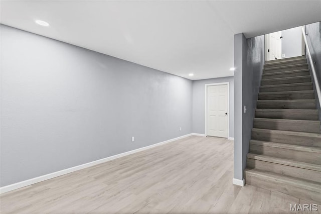705 Fulton St, Gillespie, IL 62033 - finished below grade area featuring stairway, light wood-type flooring, baseboards, and recessed lighting