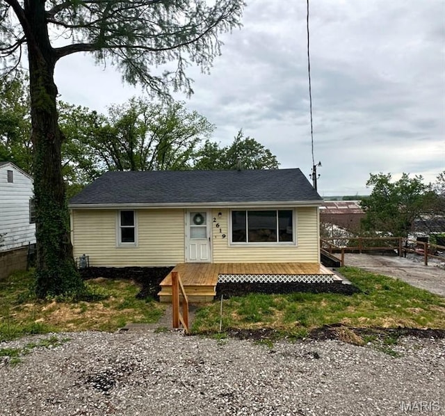 2619 Plainview Ter, Alton, IL 62002 - view of front of house with a wooden deck and fence