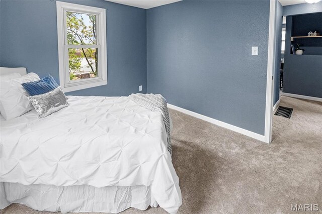 2619 Plainview Ter, Alton, IL 62002 - carpeted bedroom featuring baseboards