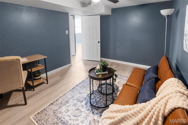 2619 Plainview Ter, Alton, IL 62002 - living area with wood finished floors, a ceiling fan, and baseboards