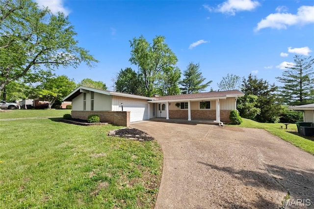 53 Graeler Dr, Saint Louis, MO 63146 - view of front facade with driveway, brick siding, a front lawn, a garage, and cooling unit